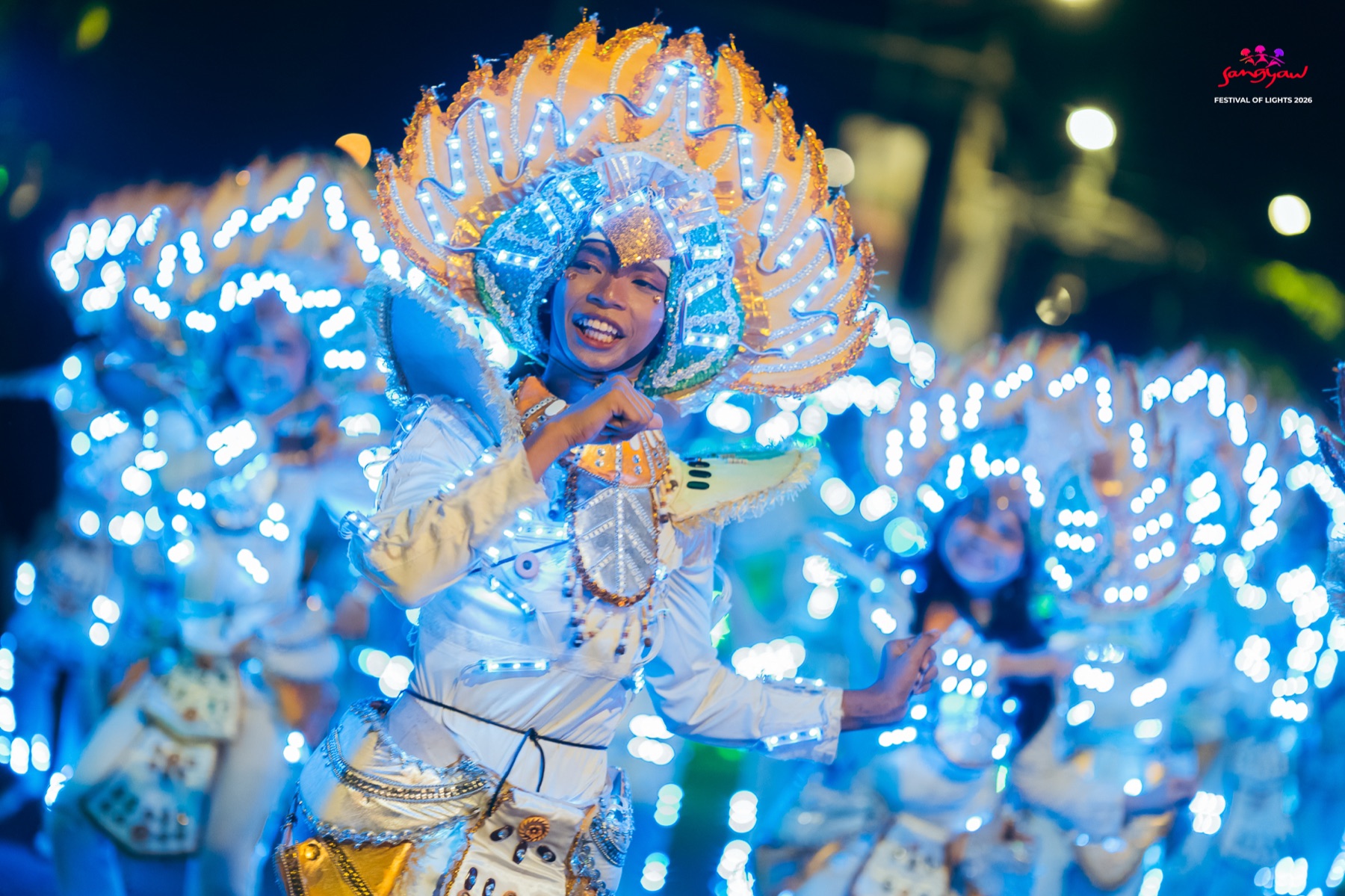 A performer in an illuminated costume at Sangyaw Festival of Lights